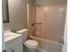 Functional bathroom featuring a vanity sink, toilet, and shower-tub combination at 25 Oak Crest Ct, Covington, GA 30016