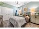 Cozy bedroom with soft lighting, stylish decor, and hardwood floors at 81 Heritage Pointe Dr, Villa Rica, GA 30180