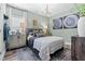 Comfortable bedroom featuring decorative lighting and stylish decor at 81 Heritage Pointe Dr, Villa Rica, GA 30180