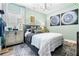 Charming bedroom with stylish decor, lots of natural light, and hardwood floors at 81 Heritage Pointe Dr, Villa Rica, GA 30180