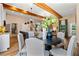 Charming dining area with wood beams, open to living area at 81 Heritage Pointe Dr, Villa Rica, GA 30180