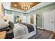 Beautiful main bedroom with a wooden ceiling and a luxurious ensuite bathroom at 81 Heritage Pointe Dr, Villa Rica, GA 30180