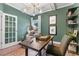 Bright home office with window, desk, modern lighting, and decor perfect for remote work at 81 Heritage Pointe Dr, Villa Rica, GA 30180
