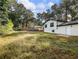 View of the backyard showcasing fencing and exterior of home at 4239 Newcomb Rd, Decatur, GA 30034