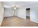 Open bedroom with a ceiling fan, natural light, and an adjoining bonus room at 4239 Newcomb Rd, Decatur, GA 30034