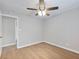 Bright bedroom with natural light, a ceiling fan, and modern flooring for comfort at 4239 Newcomb Rd, Decatur, GA 30034