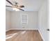 Comfortable bedroom with a ceiling fan, window, and plenty of natural light at 4239 Newcomb Rd, Decatur, GA 30034