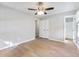 Bedroom showcasing wood floors, a ceiling fan, closet, doorway and plenty of natural light at 4239 Newcomb Rd, Decatur, GA 30034