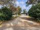 View from street of home with extra parking and attached garage at 4239 Newcomb Rd, Decatur, GA 30034