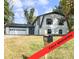 Renovated two-story home with a spacious garage and traditional architecture at 4239 Newcomb Rd, Decatur, GA 30034