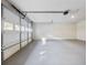 Clean and spacious garage featuring an epoxy floor and a ceiling mounted garage door opener at 4239 Newcomb Rd, Decatur, GA 30034