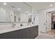 Elegant bathroom featuring double sinks, a walk-in shower, and ample storage at 788 W Marietta Nw St # 913, Atlanta, GA 30318