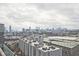 Expansive city view featuring a skyline, parking garage, and modern apartment buildings at 788 W Marietta Nw St # 913, Atlanta, GA 30318