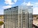 Modern high-rise condominium building featuring floor-to-ceiling windows and private balconies on every unit at 788 W Marietta Nw St # 913, Atlanta, GA 30318