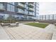 Building exterior featuring a lounge area with artificial turf and comfortable seating at 788 W Marietta Nw St # 913, Atlanta, GA 30318