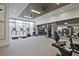 Well-equipped gym with treadmills, stationary bikes, weight machines, and ample natural light through large windows at 788 W Marietta Nw St # 913, Atlanta, GA 30318
