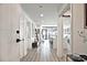 Hallway features wood flooring and a view of the kitchen at 788 W Marietta Nw St # 913, Atlanta, GA 30318