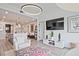 Bright living room featuring modern decor, an open floor plan, and white accents at 788 W Marietta Nw St # 913, Atlanta, GA 30318