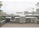 Outdoor kitchen with grill and countertop space, perfect for entertaining at 788 W Marietta Nw St # 913, Atlanta, GA 30318