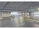 Spacious parking garage with clearly marked lanes and signage for residents' convenience at 788 W Marietta Nw St # 913, Atlanta, GA 30318