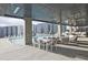 A stylish outdoor pool area with lounge chairs, tables, and comfortable seating for relaxation and socializing at 788 W Marietta Nw St # 913, Atlanta, GA 30318