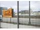 Wooden restaurant sign, view through window, 