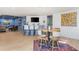 Open concept basement with bar, dining area, and seating area at 1516 Ashford Club Ne Ct, Brookhaven, GA 30319