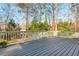 A well maintained backyard deck perfect for relaxing outdoors at 1516 Ashford Club Ne Ct, Brookhaven, GA 30319