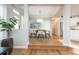 Bright dining room with large windows, modern lighting, and hardwood floors at 1516 Ashford Club Ne Ct, Brookhaven, GA 30319