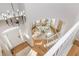 View of the bright, white foyer from the top of the stairs at 1516 Ashford Club Ne Ct, Brookhaven, GA 30319