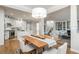 Spacious living space showing open flow between kitchen, dining, and living room areas at 1516 Ashford Club Ne Ct, Brookhaven, GA 30319