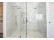 The bathroom features a glass-enclosed, tiled walk-in shower with dual shower heads at 1516 Ashford Club Ne Ct, Brookhaven, GA 30319