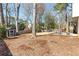 Spacious backyard with a storage shed and potential for various outdoor activities at 4122 Antler Se Trl, Smyrna, GA 30082
