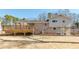 Rear view of a home with a deck that provides an elevated outdoor space at 4122 Antler Se Trl, Smyrna, GA 30082