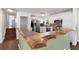 Modern kitchen with sleek white cabinets, stainless steel appliances, and a unique wooden breakfast bar at 4122 Antler Se Trl, Smyrna, GA 30082