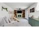 Bright living room features a decorative fireplace, play area, and ample natural light at 4122 Antler Se Trl, Smyrna, GA 30082