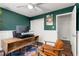 Stylish home office features a wood desk, and walls in two-tone paint at 4122 Antler Se Trl, Smyrna, GA 30082