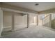 Spacious basement featuring carpeted floors, support beams, stairs and natural light at 2917 Toney Dr, Decatur, GA 30032