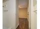 Bathroom with white shower tiles and view into a bedroom with hardwood floors at 2917 Toney Dr, Decatur, GA 30032