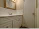 Bathroom with white tiled walls, modern vanity, sink, and hardware at 2917 Toney Dr, Decatur, GA 30032