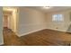 Open-concept living room with beautiful hardwood floors and natural lighting at 2917 Toney Dr, Decatur, GA 30032