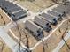 Overhead view of a neighborhood with well-maintained homes, sidewalks, and tree-lined streets at 804 White St, Villa Rica, GA 30180