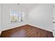A sunlit bedroom with clean white walls and flooring providing a serene, cozy feel at 804 White St, Villa Rica, GA 30180