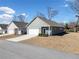Inviting single-story home with well-manicured landscaping and an attached two-car garage at 804 White St, Villa Rica, GA 30180