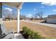 Inviting front porch with a seating area, and landscaped surroundings, overlooking street at 804 White St, Villa Rica, GA 30180