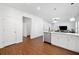 Spacious kitchen featuring stainless steel appliances, an island with barstool seating, and an open-concept design at 804 White St, Villa Rica, GA 30180