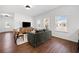 Cozy living room featuring stylish furniture, ample natural light, and a decorative TV console at 804 White St, Villa Rica, GA 30180