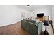Comfortable living room setup with a plush sofa, decorative accents, and hardwood floors at 804 White St, Villa Rica, GA 30180