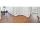 Open-concept living space with wood flooring, a dining area, and bright natural light at 804 White St, Villa Rica, GA 30180