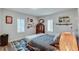 Nicely decorated bedroom with modern decor, comfy bed, and ample natural light from the two windows at 2312 Wayside Ne Dr, Brookhaven, GA 30319